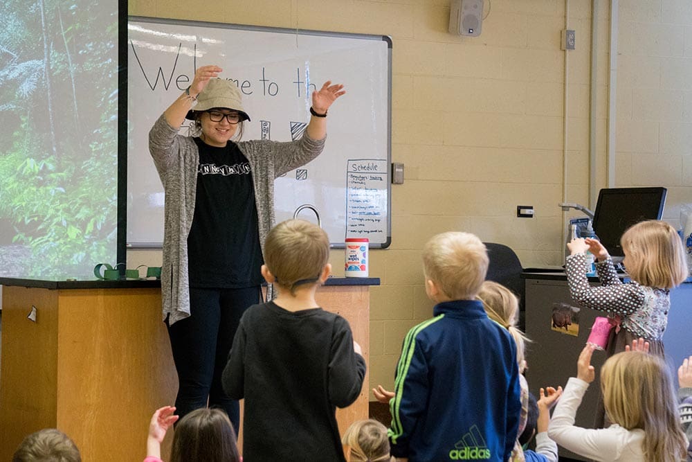 student teaching kids about science
