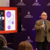 Dr. Calum MacKellar giving a presentation