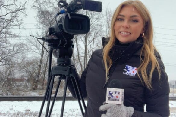 Journalism student making a newscast on location