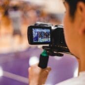 Media communications student with go-pro camera