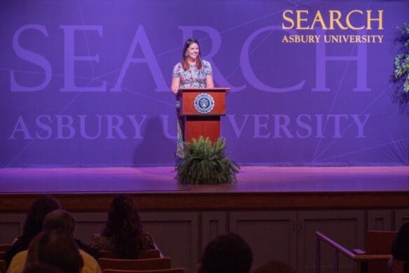 Dr. Jessica Hooten Wilson delivering a lecture