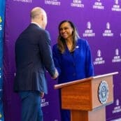 Dr. Kevin Brown and Dr. Reneau Waggoner shaking hands