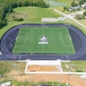 aerial view of construction near track and field