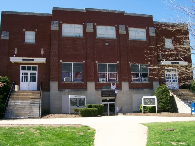 Front exterior of the former Doddridge-Holland Student Union at Asbury University, a brick building once home to the CPO, bookstore, and gym.