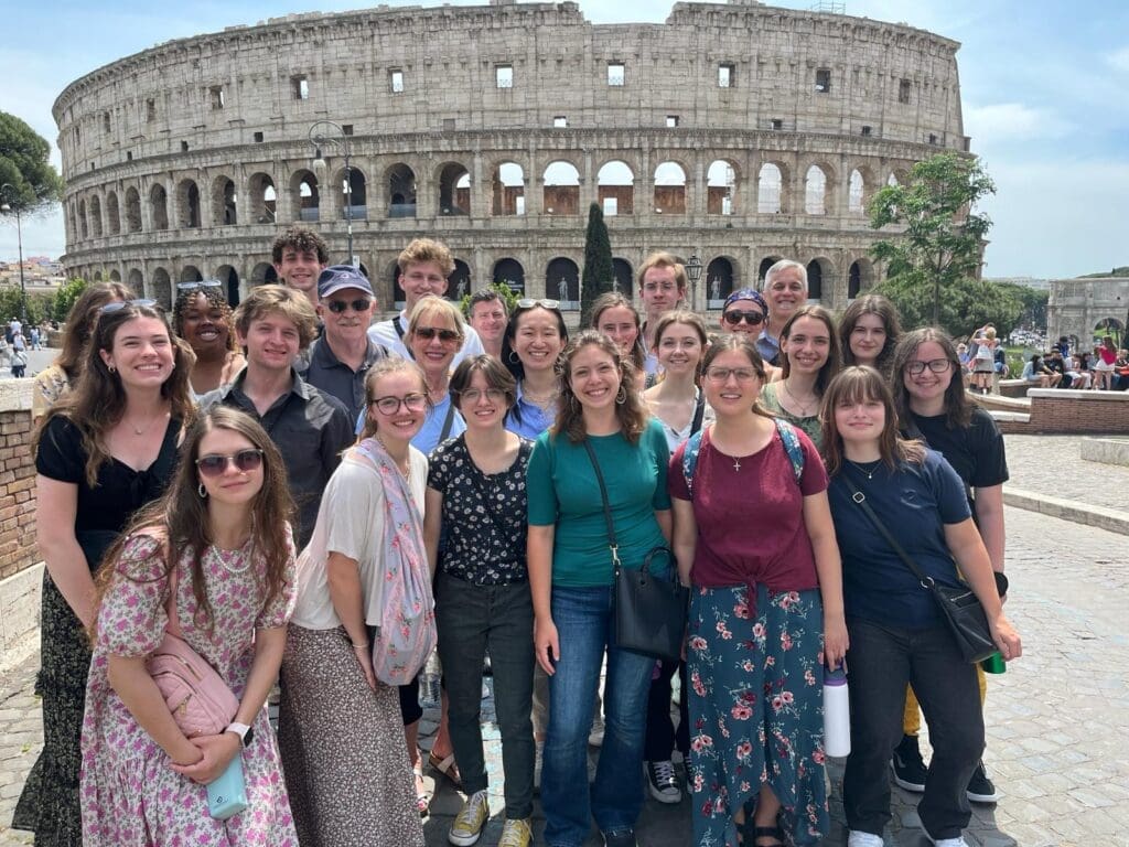 Group of Asbury students in front of the Colosseum in Rome, Italy.