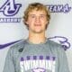 Asbury Christian Studies student headshot in front of an TeamAU branded graphic.
