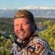 Asbury Christian Studies student headshot in front of mountains in the great outdoors.