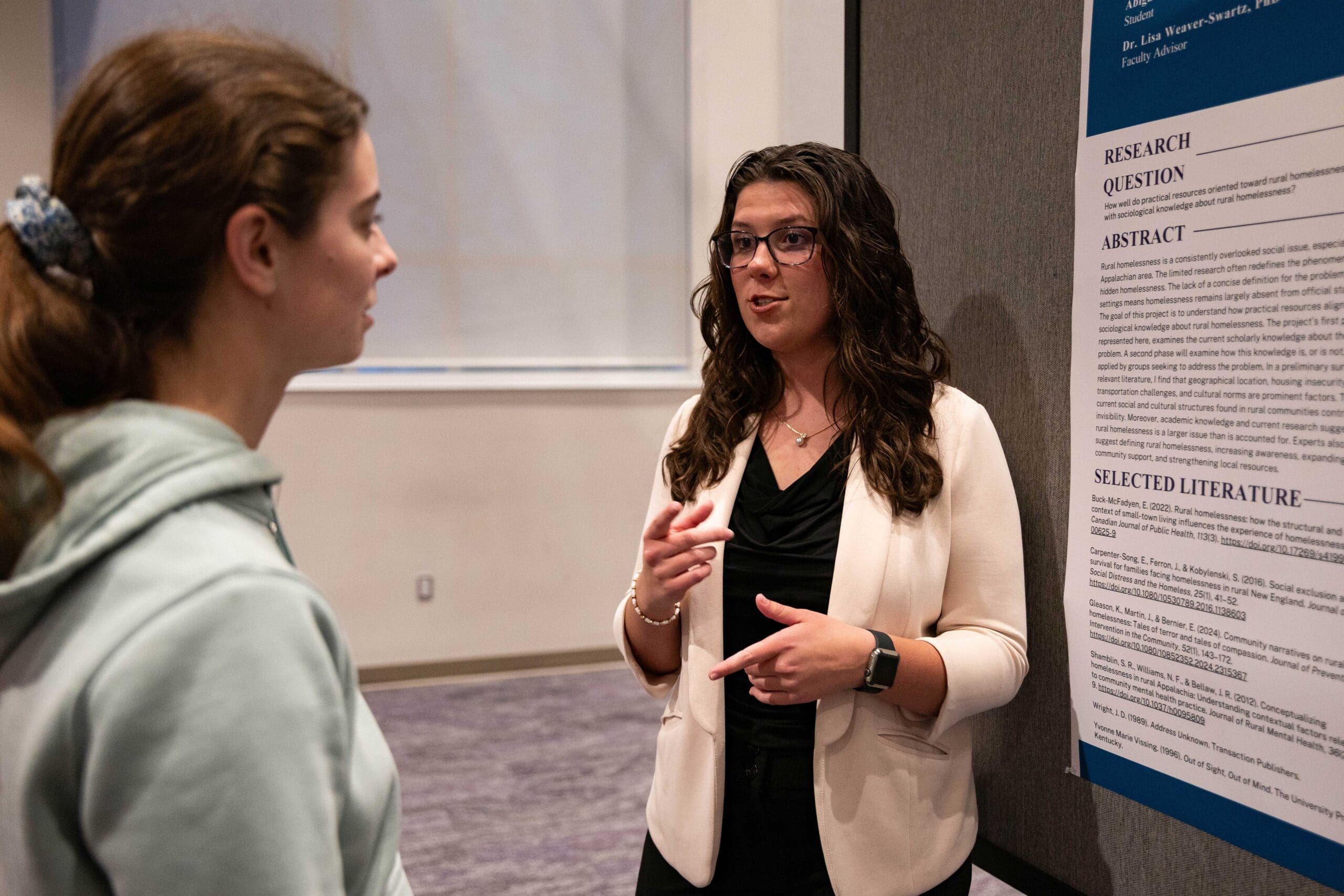 Female students presenting at the Search Symposium Asbury.