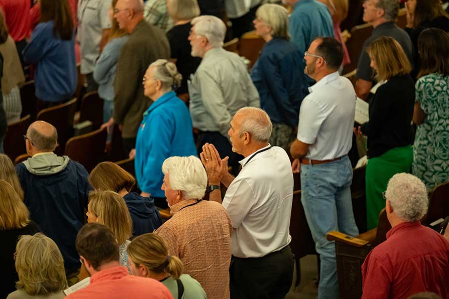 Group from above of men and women at Chapel at Asbury's Reunion.