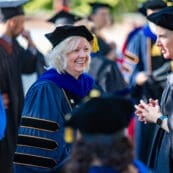 Asbury University professor Dr. Kim Okesson smiles during Academic Convocation
