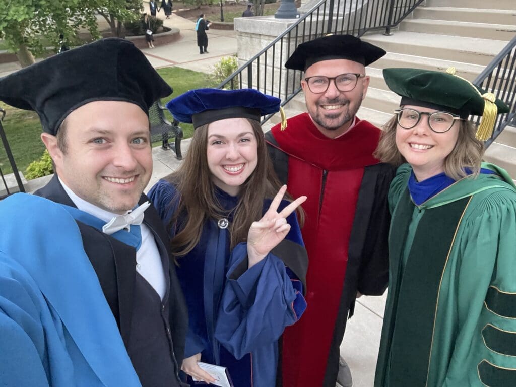 Dr. Paul Sunderland and professors at Asbury University