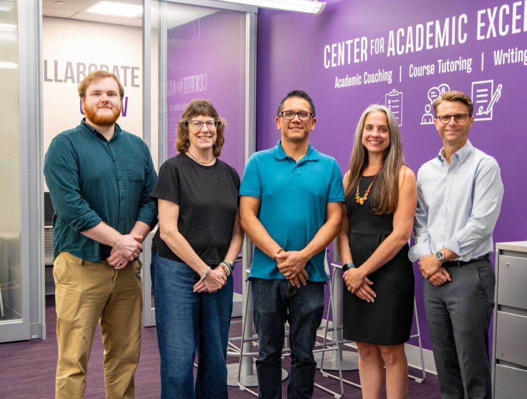 The Asbury Center for Academic Excellence team photo in the center.