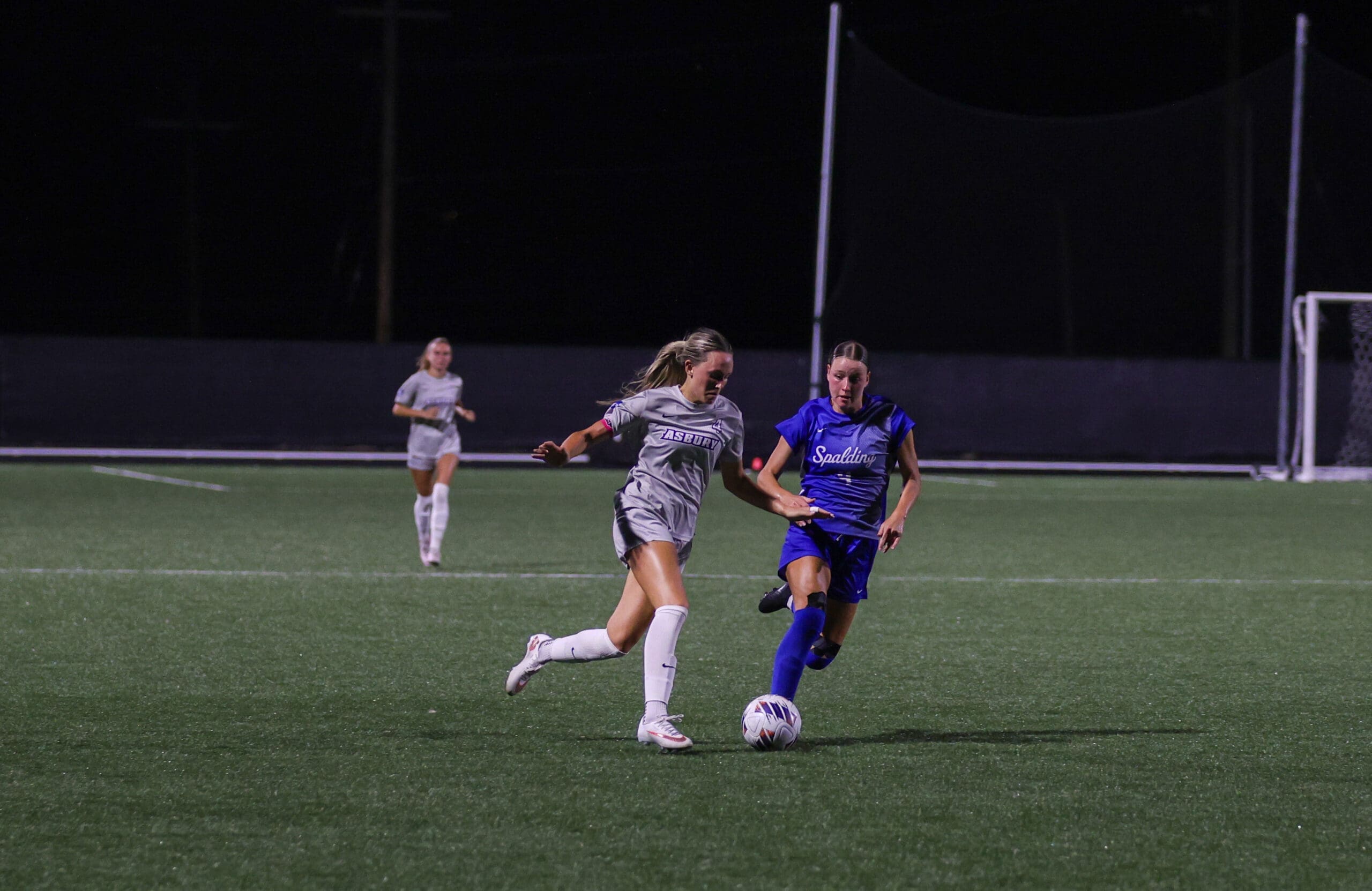 Anna Sparks playing soccer at Asbury University