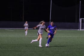 Anna Sparks playing soccer at Asbury University