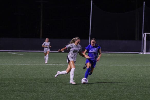 Anna Sparks playing soccer at Asbury University