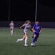 Anna Sparks playing soccer at Asbury University
