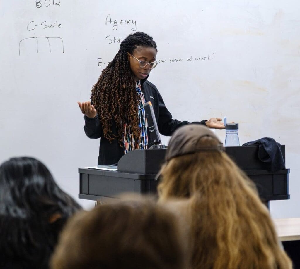 Asbury DSB professor Dr. Tolu Bewaji prays before class.