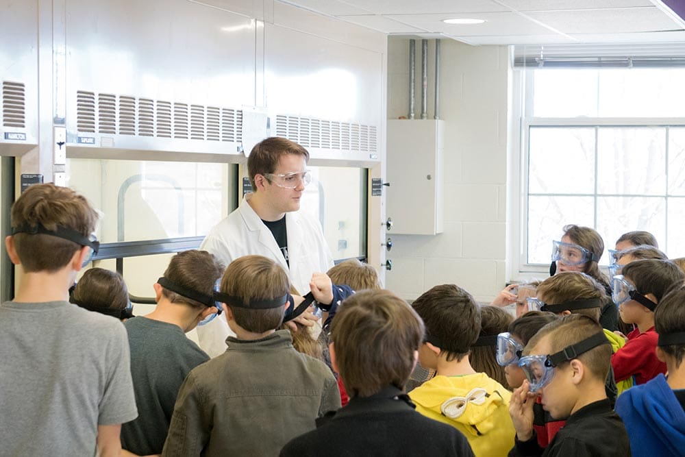 student teaching kids about science