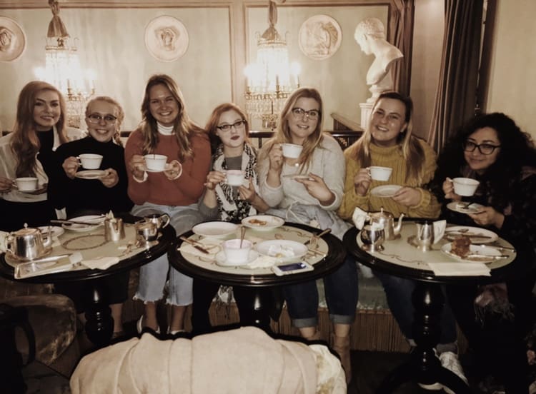 Students drinking coffee at a café