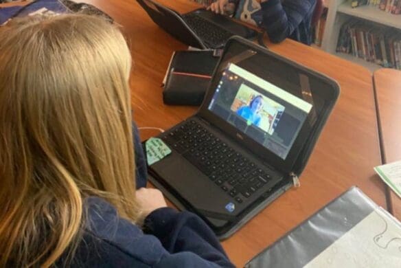 Person using a laptop for a videoconference