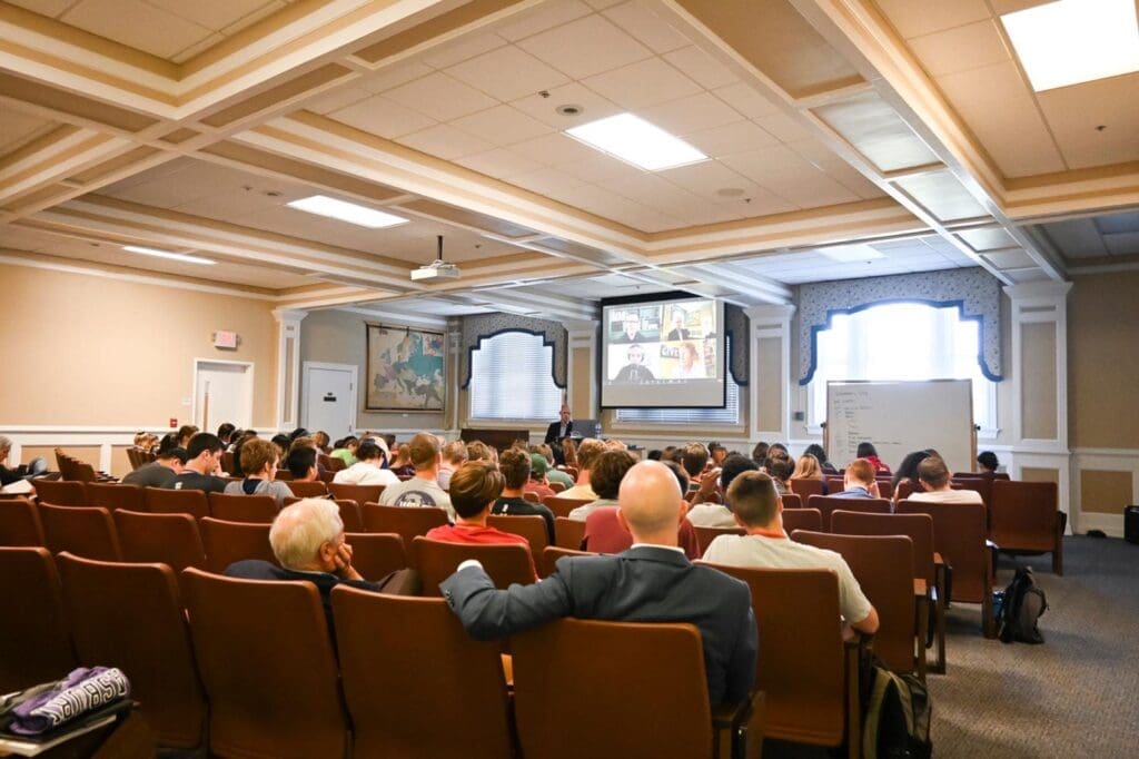 People listening to a presentation