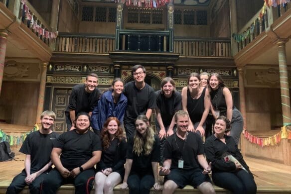 Students on stage at the Globe Theatre in London