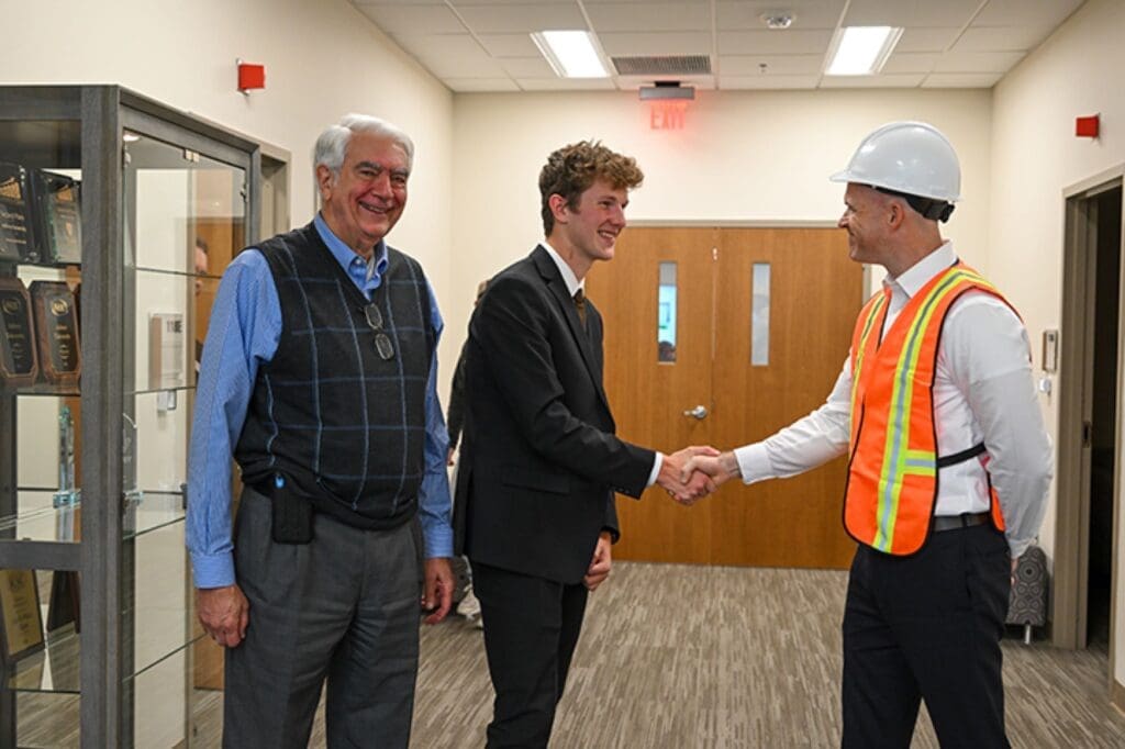 Business competition contestant shaking hands