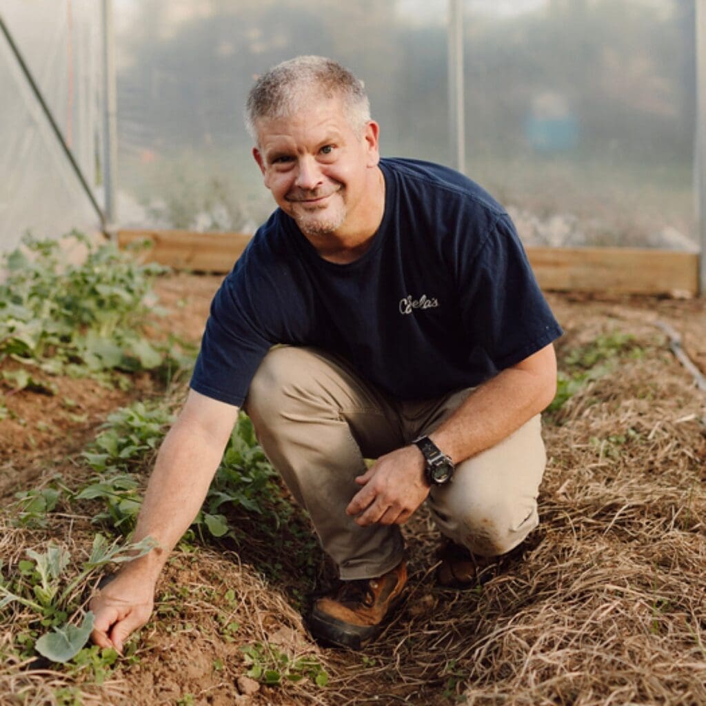 Dr. Marvin Ruffner working in a greenhouse