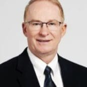 Headshot of Dr. Russell Raymond ’75