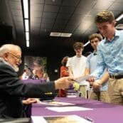 John DeCuir signing autographs