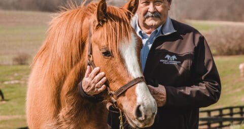 Harold Rainwater ’69 with a horse