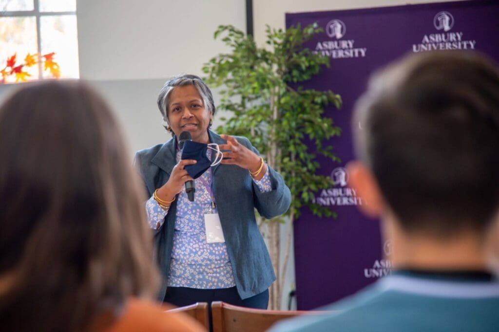 Dr. Esther Jadhav speaking to students