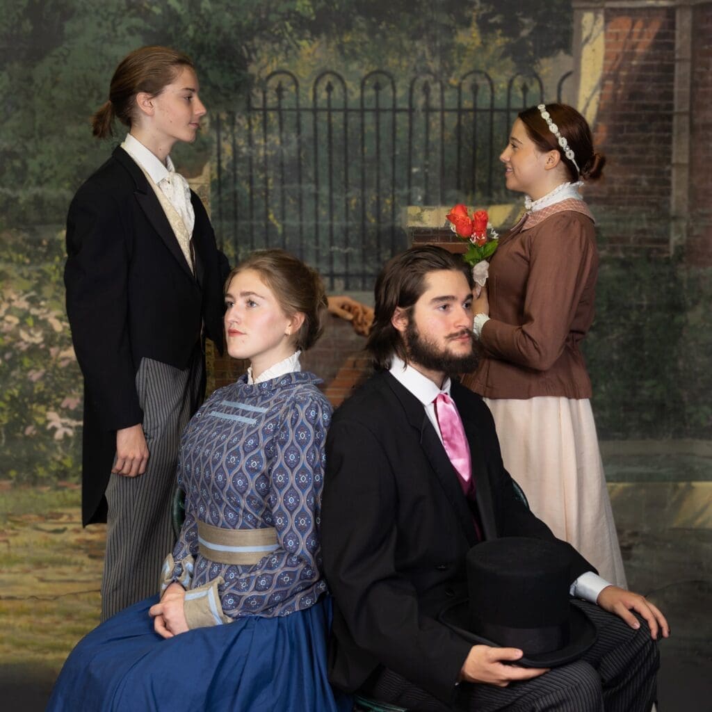 Student actors posing on a set