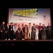 Group of award winners standing onstage