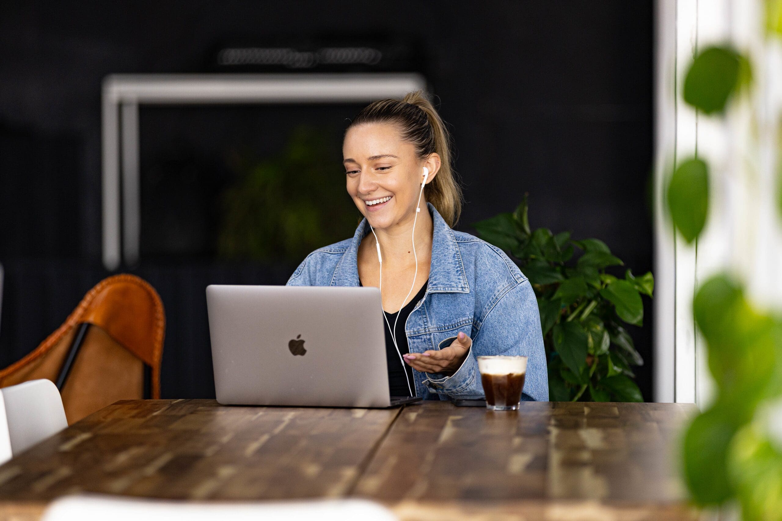 Asbury female student using a laptop at a table