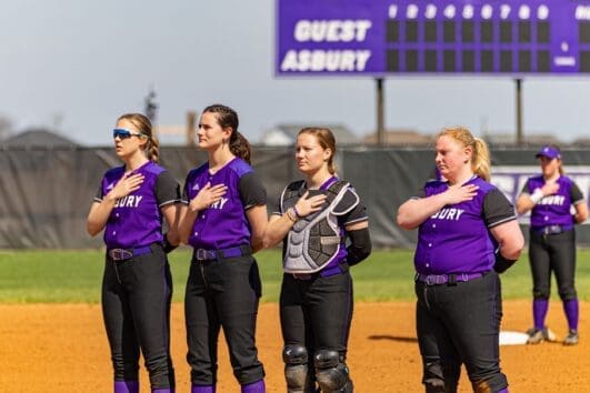 Asbury women's softball team participates in pledge of allegiance to the flag