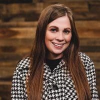 Female Asbury social work alumni smiling at camera