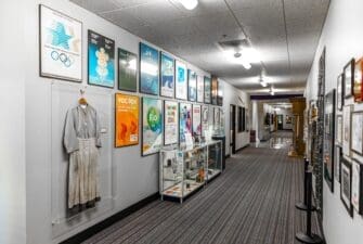 Hallway in the Miller building with movie and film props and posters on the wall