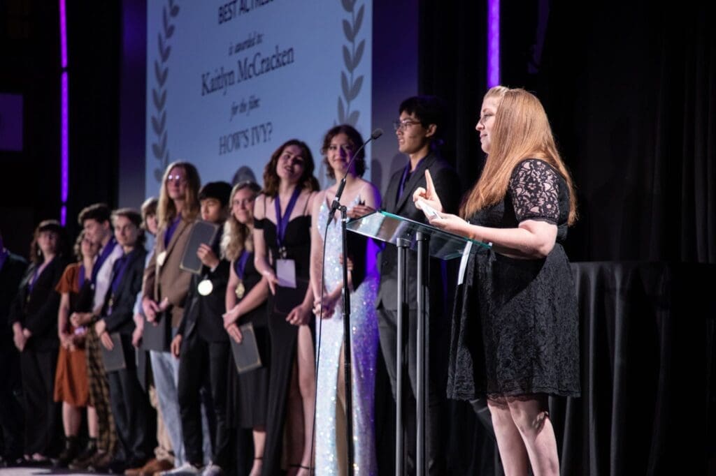 Dr. Weaver-Seitz presenting an award at the Highbridge Film Festival