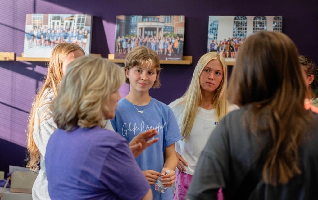 Asbury University Honors Program group of students talking with a Professor.