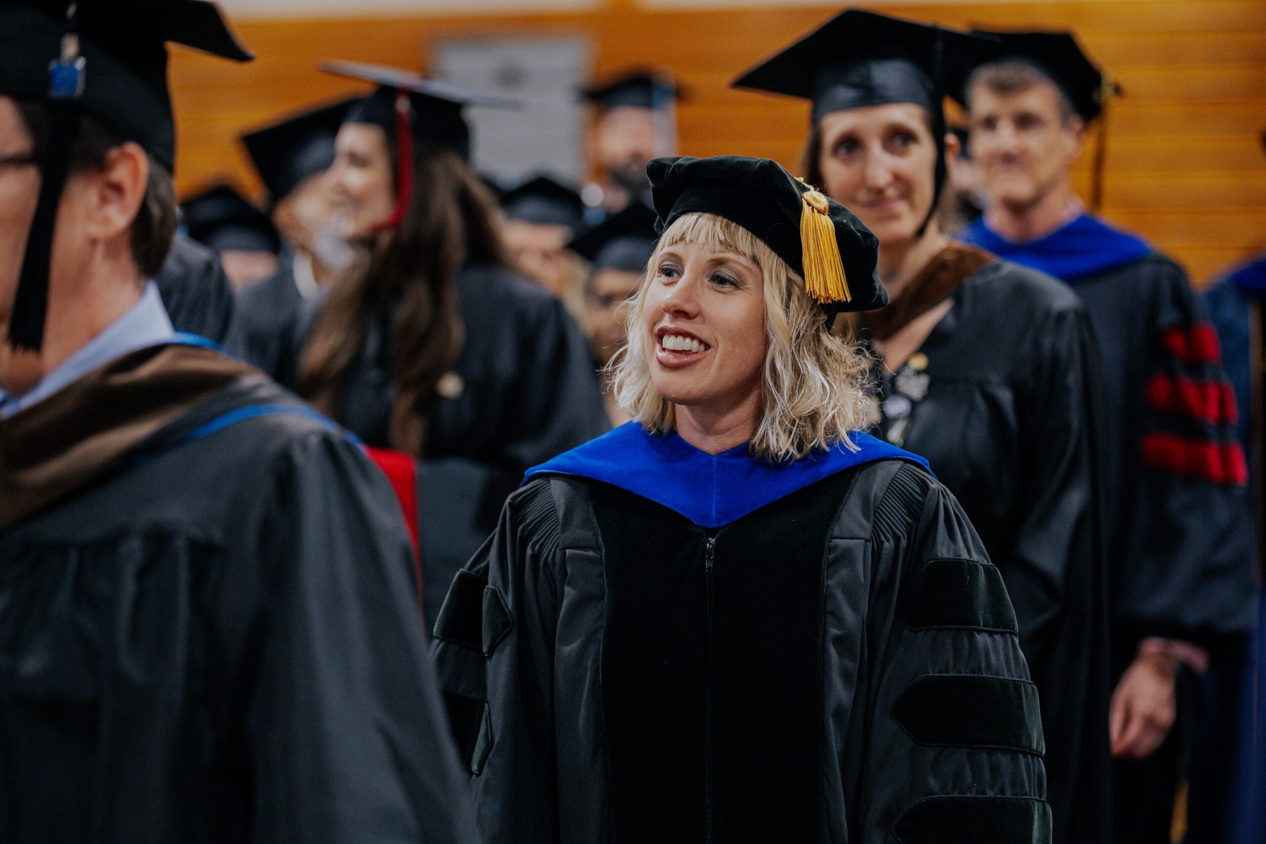 asbury university professors smile during academic convocation