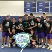 asbury men's tennis team stand smiling