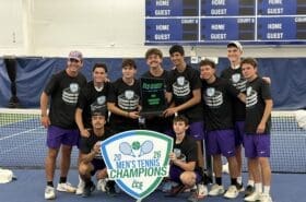 asbury men's tennis team stand smiling
