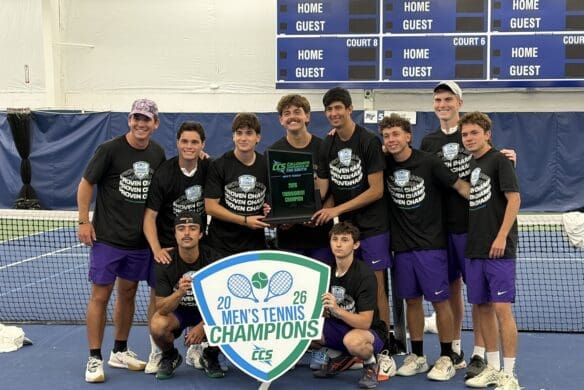 asbury men's tennis team stand smiling