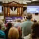 Asbury University alumni worship during the Reunion Hymn Sing