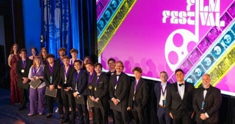 Asbury Highbridge winners stand on the Hughes Auditorium stage