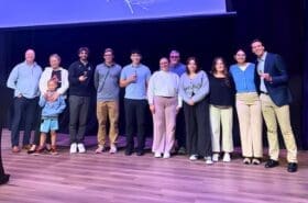 Asbury Business students on the Collaborative Learning Center stage.