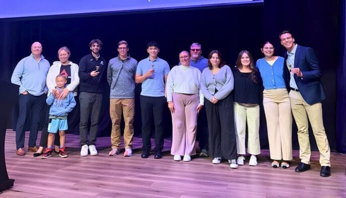 Asbury Business students on the Collaborative Learning Center stage.